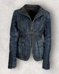 Blue denim jacket on a textured gray background