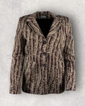 Patterned jacket on a textured gray background